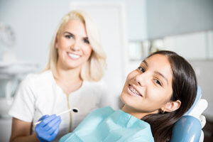 A girl visits her pediatric orthodontist in Houston
