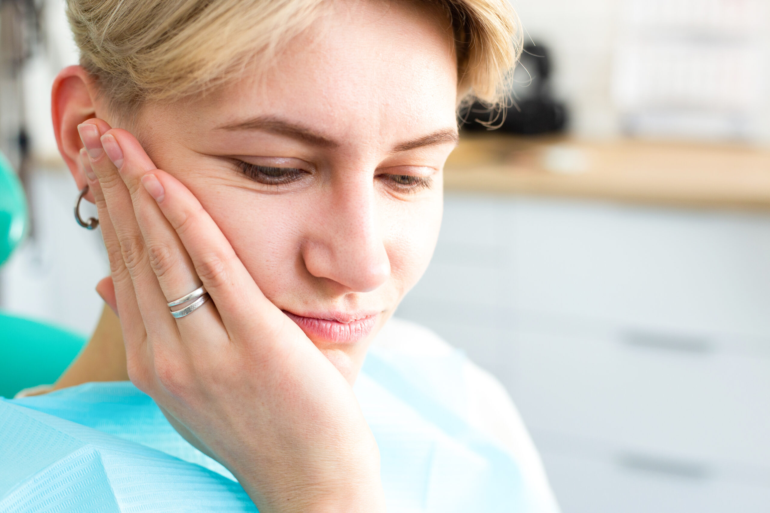 Woman at the dentist consultation. Checking and dental treatment in a clinic